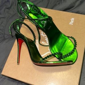 Christian Louboutin  green heels